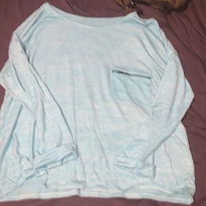 Long sleeve, light blue shirt with little pocket